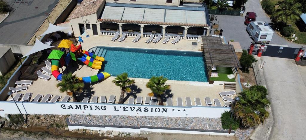 Kolam renang di atau dekat dengan Camping L'Evasion 4 etoiles