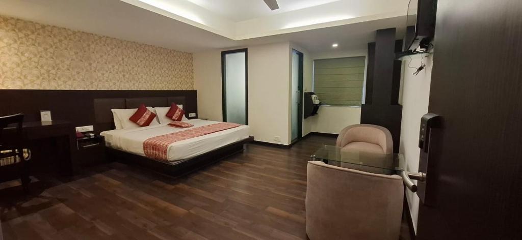 Postel nebo postele na pokoji v ubytování Viceroy Boutique Hotel