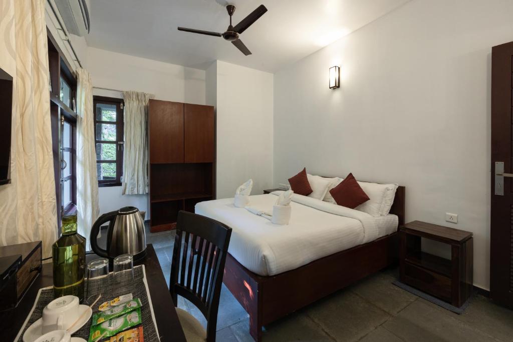 Avadale Munnar (Stag Groups Not Allowed)客房内的一张或多张床位