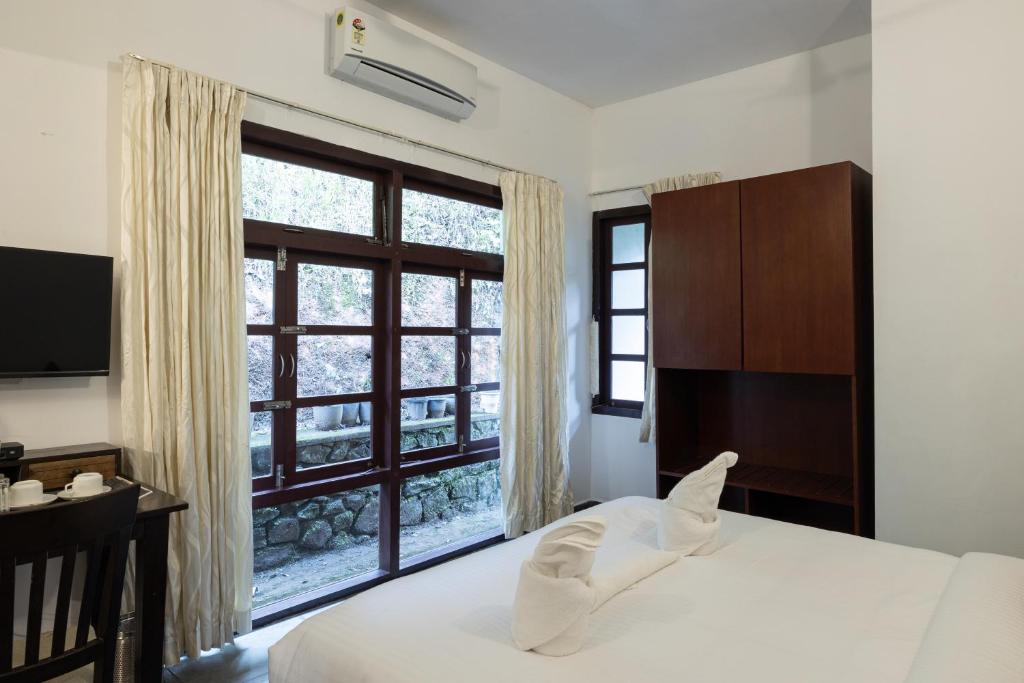 Avadale Munnar (Stag Groups Not Allowed)客房内的一张或多张床位