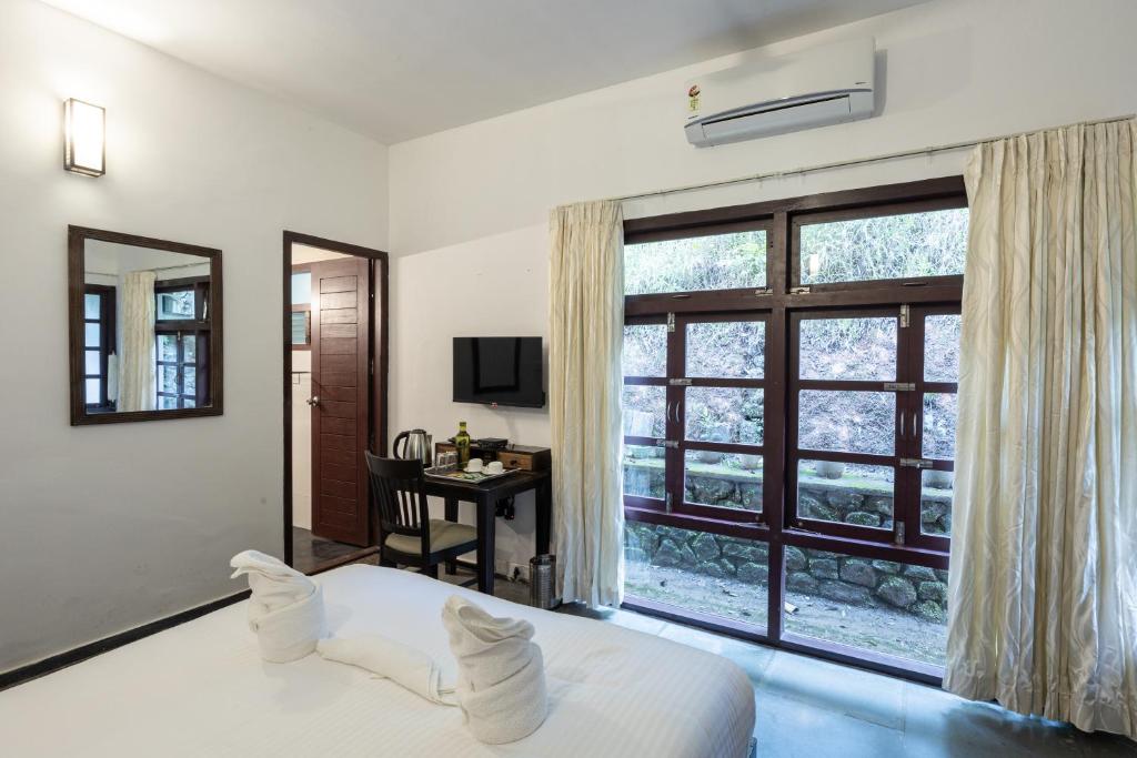 Avadale Munnar (Stag Groups Not Allowed)客房内的一张或多张床位
