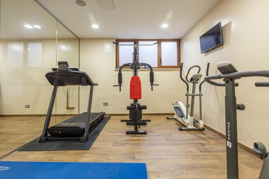 a gym with cardio equipment in a room at Polidor Camping Resort in Poreč