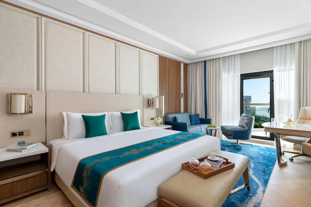 Postel nebo postele na pokoji v ubytování hotel julee