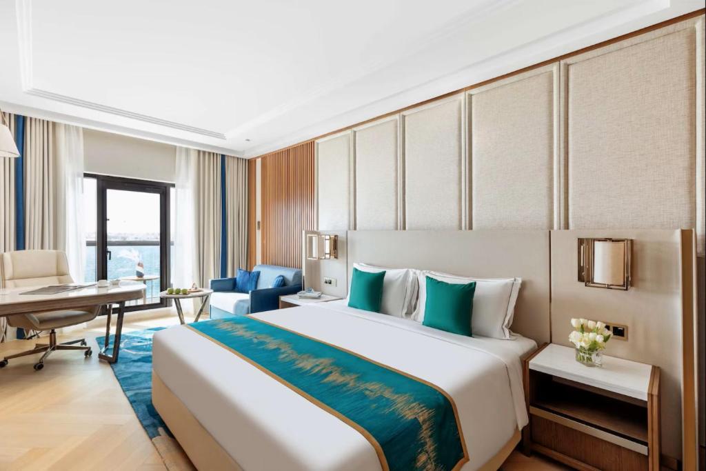 Postel nebo postele na pokoji v ubytování hotel julee