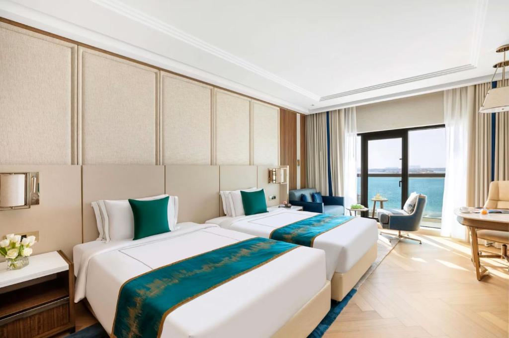 Postel nebo postele na pokoji v ubytování hotel julee