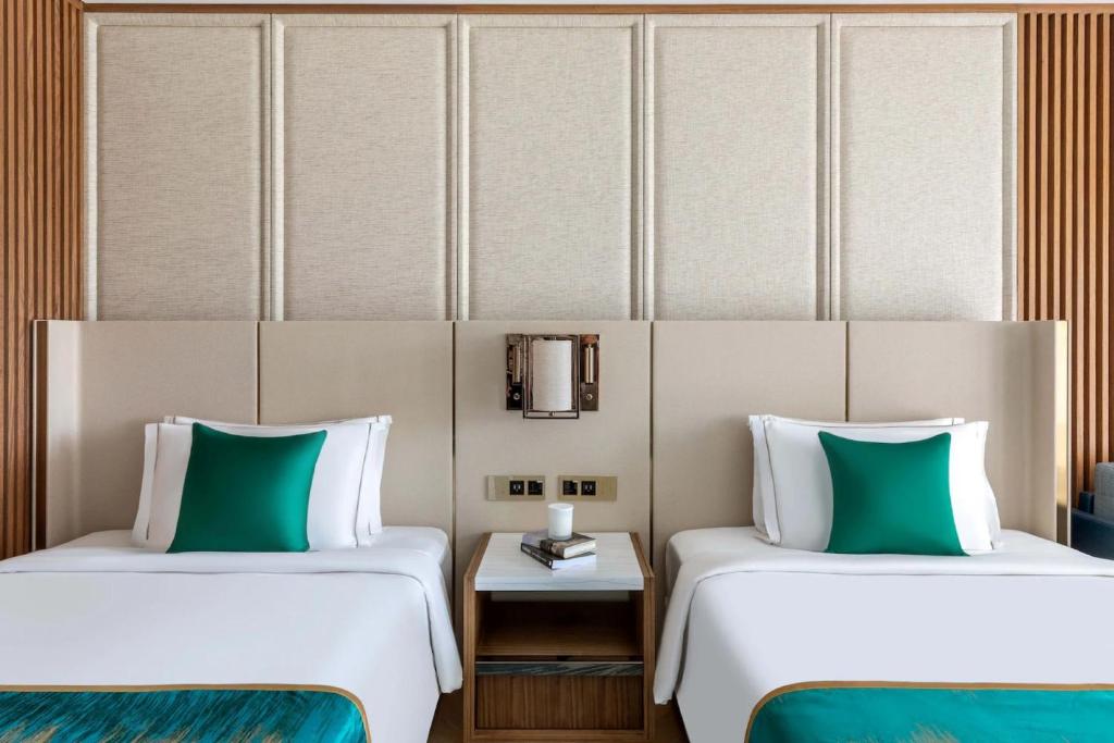 Postel nebo postele na pokoji v ubytování hotel julee