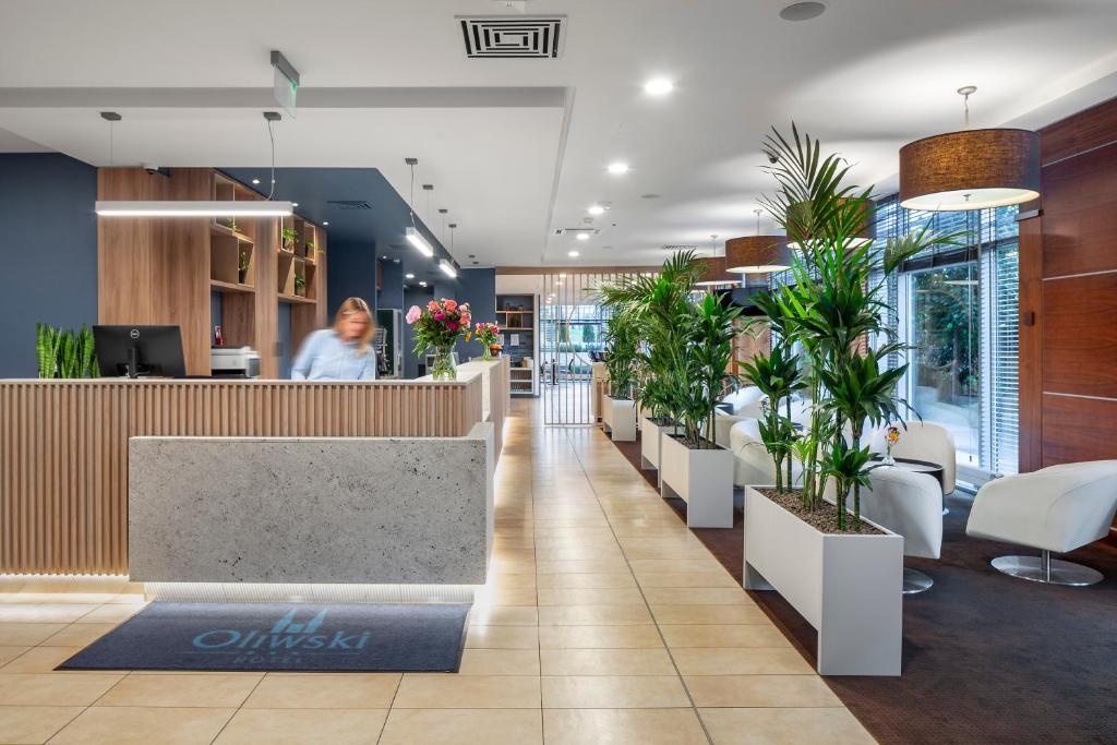 Lobby alebo recepcia v ubytovaní Hotel Oliwski