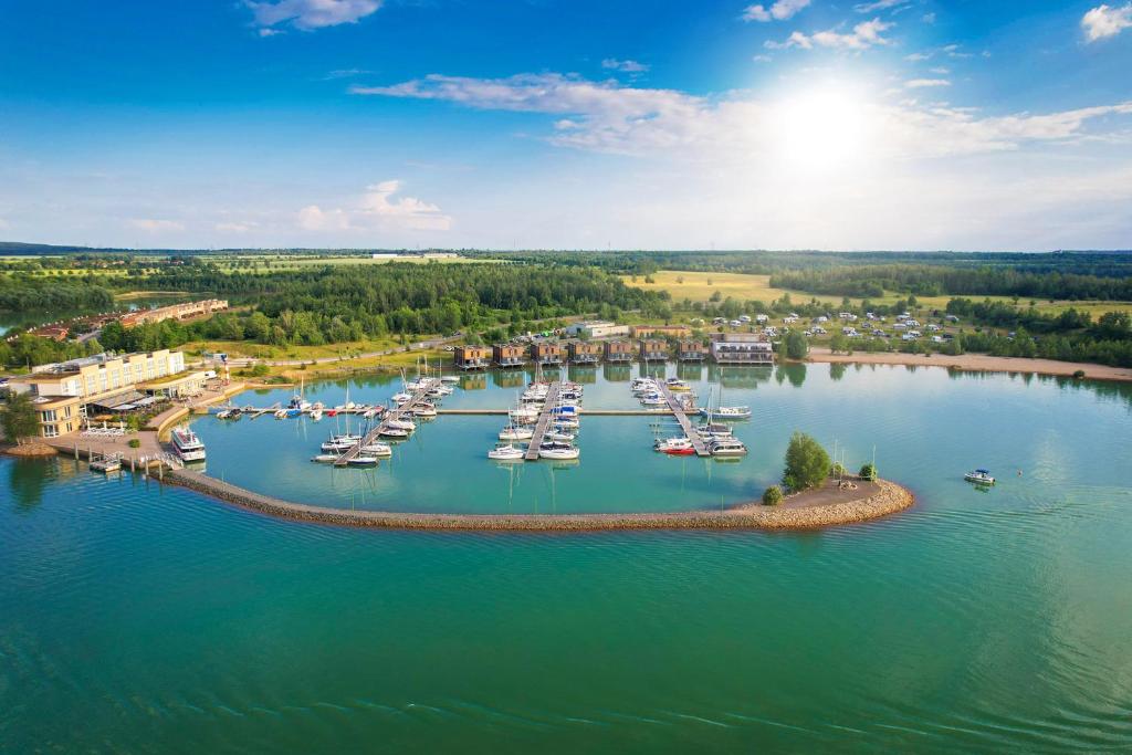 an aerial view of boats docked in a harbor at LAGOVIDA Leuchtturm am Störmthaler See in Großpösna