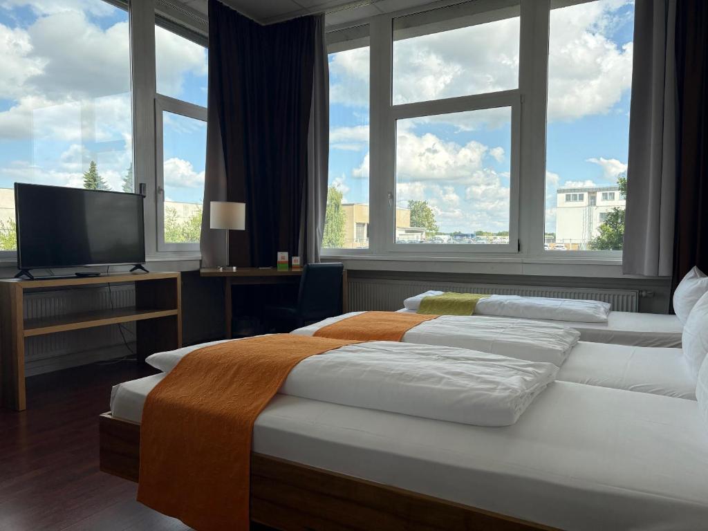 AMH Airport-Messe-Hotel Stuttgart - Трехместный номер