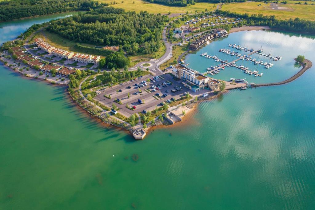 an aerial view of a marina with boats in the water at LAGOVIDA Möwenblick c am Störmthaler See in Großpösna
