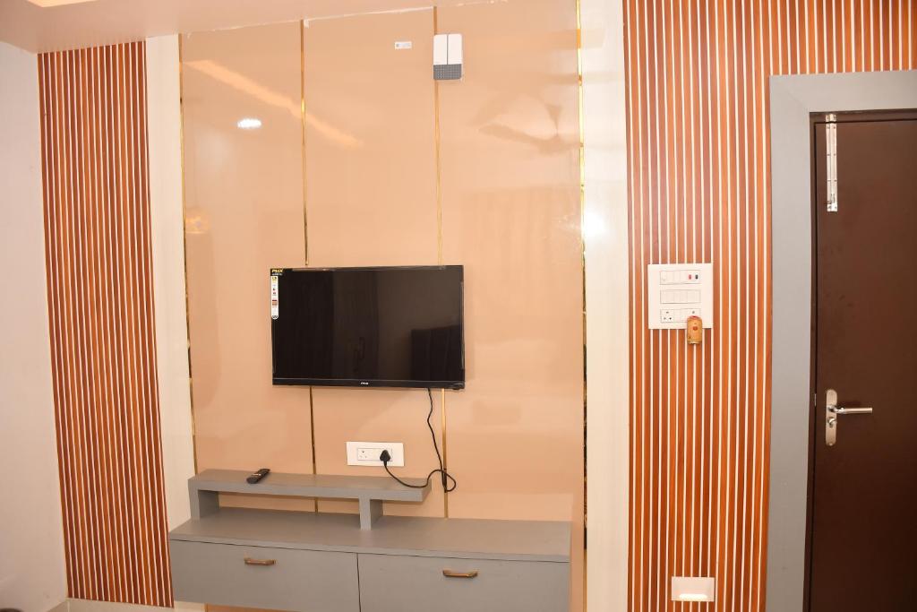 TV a/nebo společenská místnost v ubytování Hotel Ratneswar
