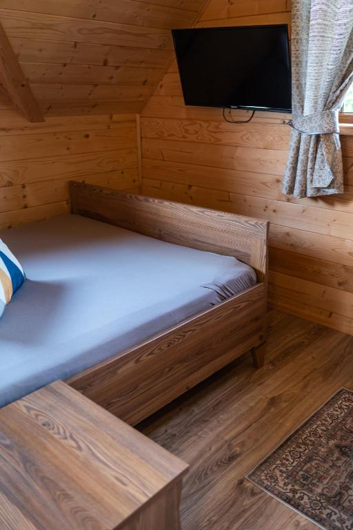 Posteľ alebo postele v izbe v ubytovaní DOMEK POD LIMBAMI IV