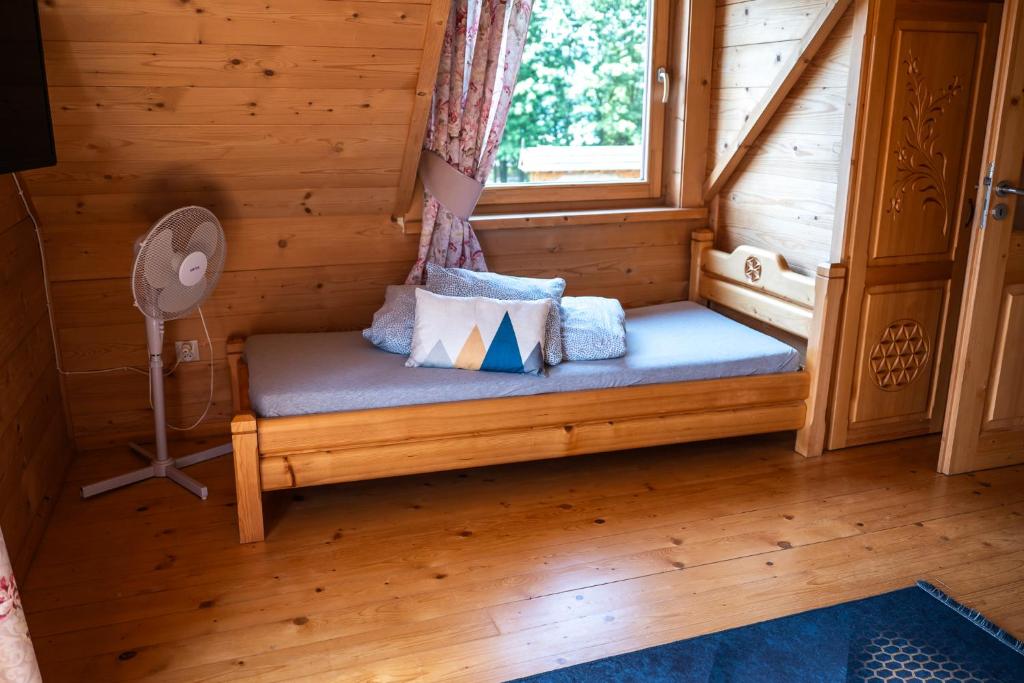 Posteľ alebo postele v izbe v ubytovaní Domek pod Limbami