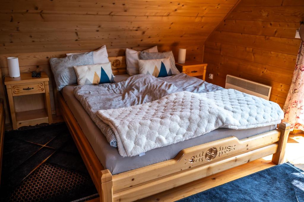 Posteľ alebo postele v izbe v ubytovaní Domek pod Limbami