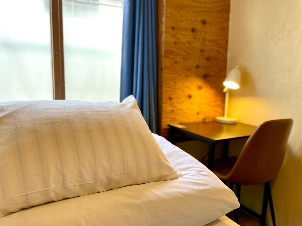 Voodi või voodid majutusasutuse Nomad Hostel Classic toas