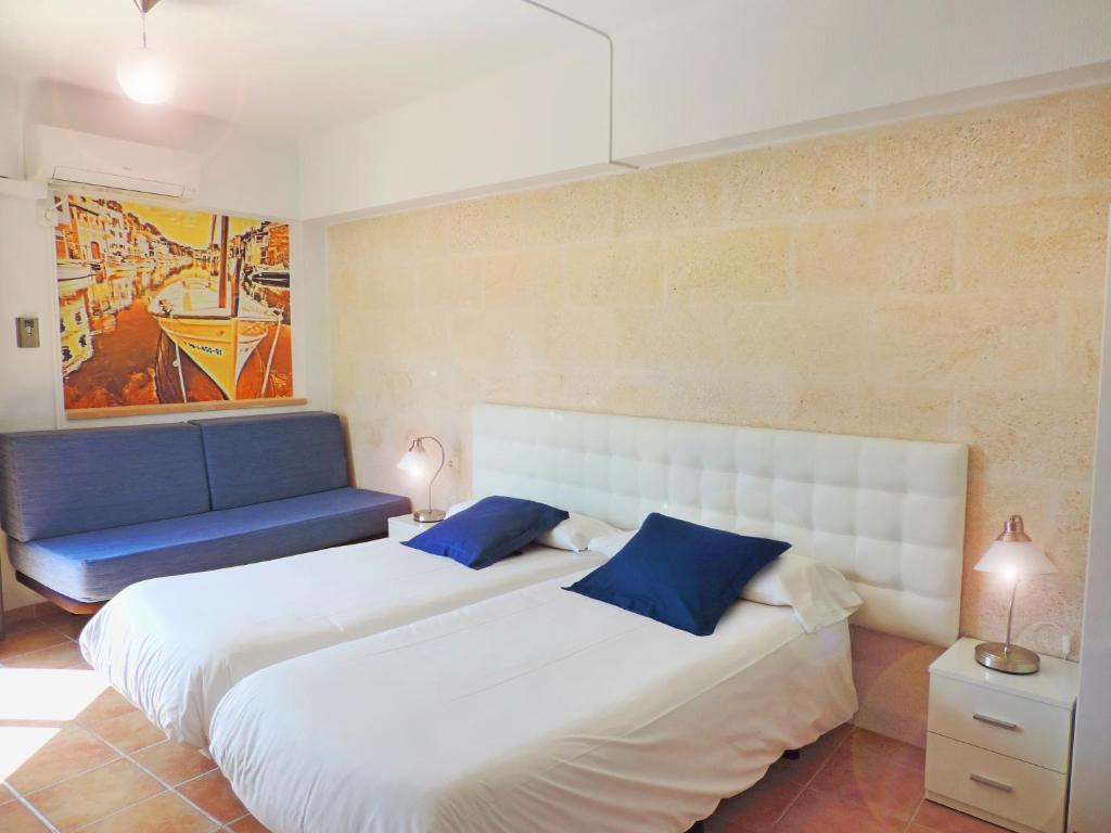 Postel nebo postele na pokoji v ubytování Marblau Mallorca