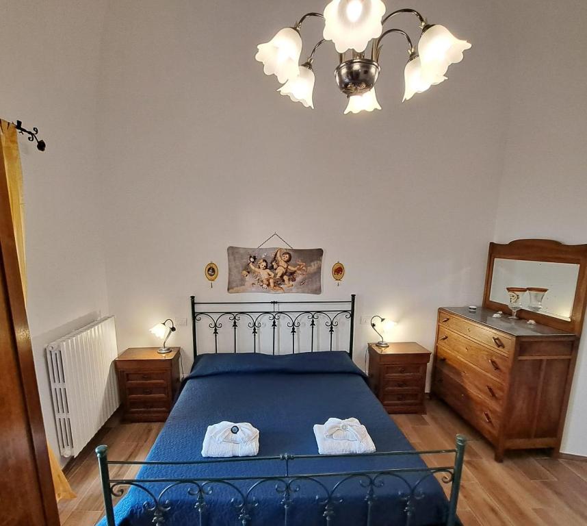 Postel nebo postele na pokoji v ubytování AL BELVEDERE