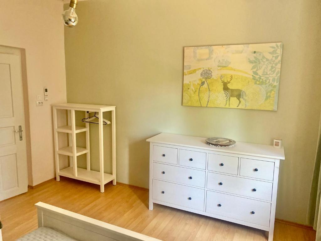Postel nebo postele na pokoji v ubytování Szélcsend Apartman