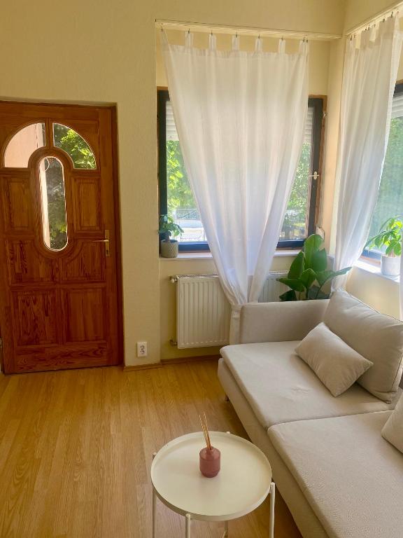 Posezení v ubytování Szélcsend Apartman