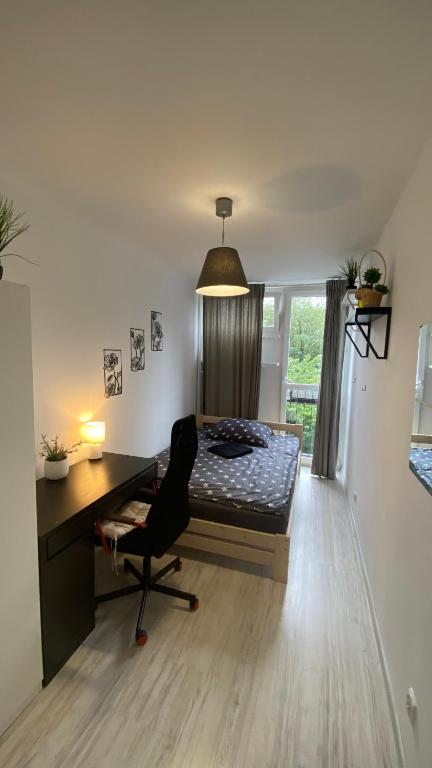 Ένα ή περισσότερα κρεβάτια σε δωμάτιο στο Rooms in Warsaw - G9