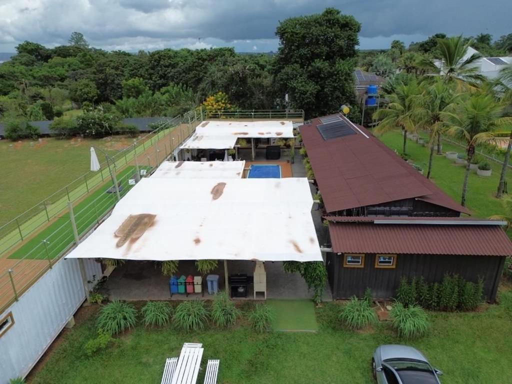 an overhead view of a house with a white roof at Grand Villela Home Stay - Espaço Inteiro - 32 pessoas - Lago Sul - Brasília-DF in Brasilia