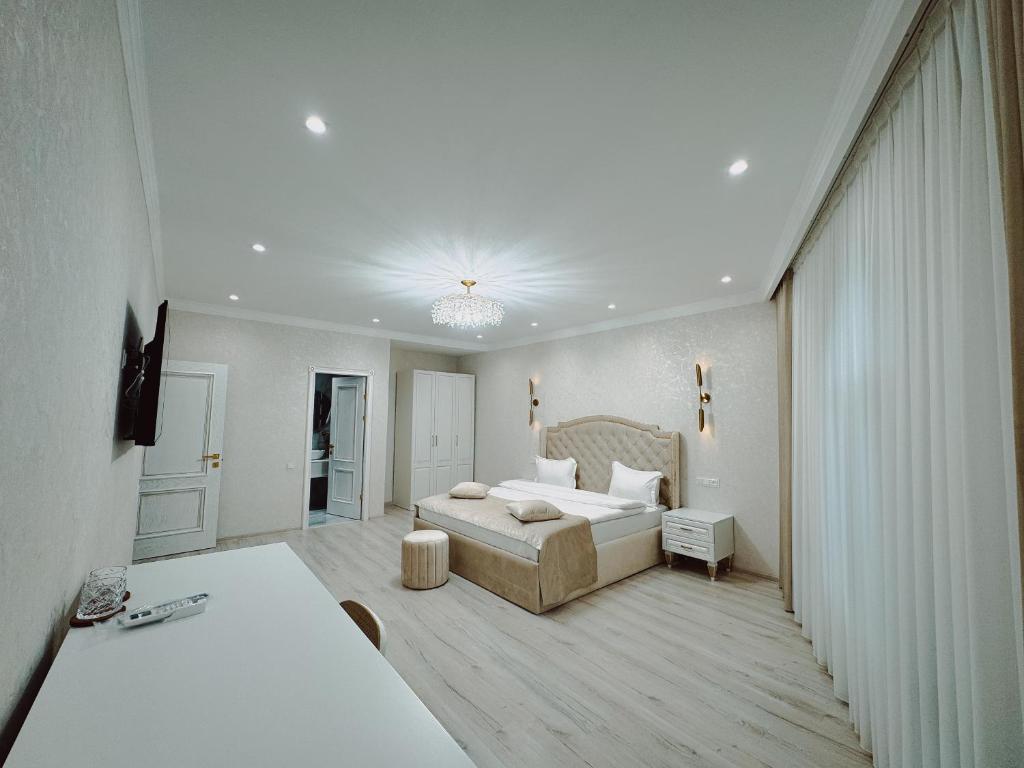 Ένα ή περισσότερα κρεβάτια σε δωμάτιο στο Yerevan In Boutique Hotel