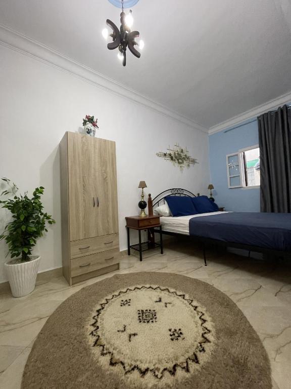 Ένα ή περισσότερα κρεβάτια σε δωμάτιο στο Lovely small apartment in the heart of Medina