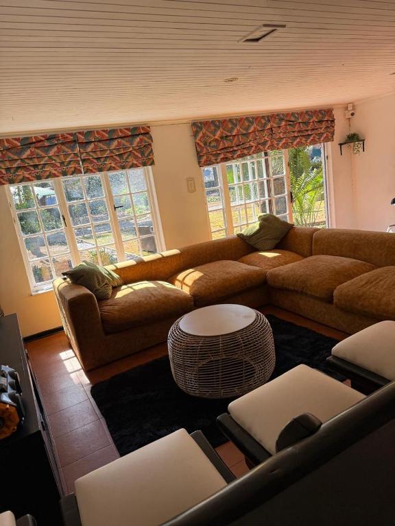 Un lugar para sentarse en CR BnB GUEST HOUSE