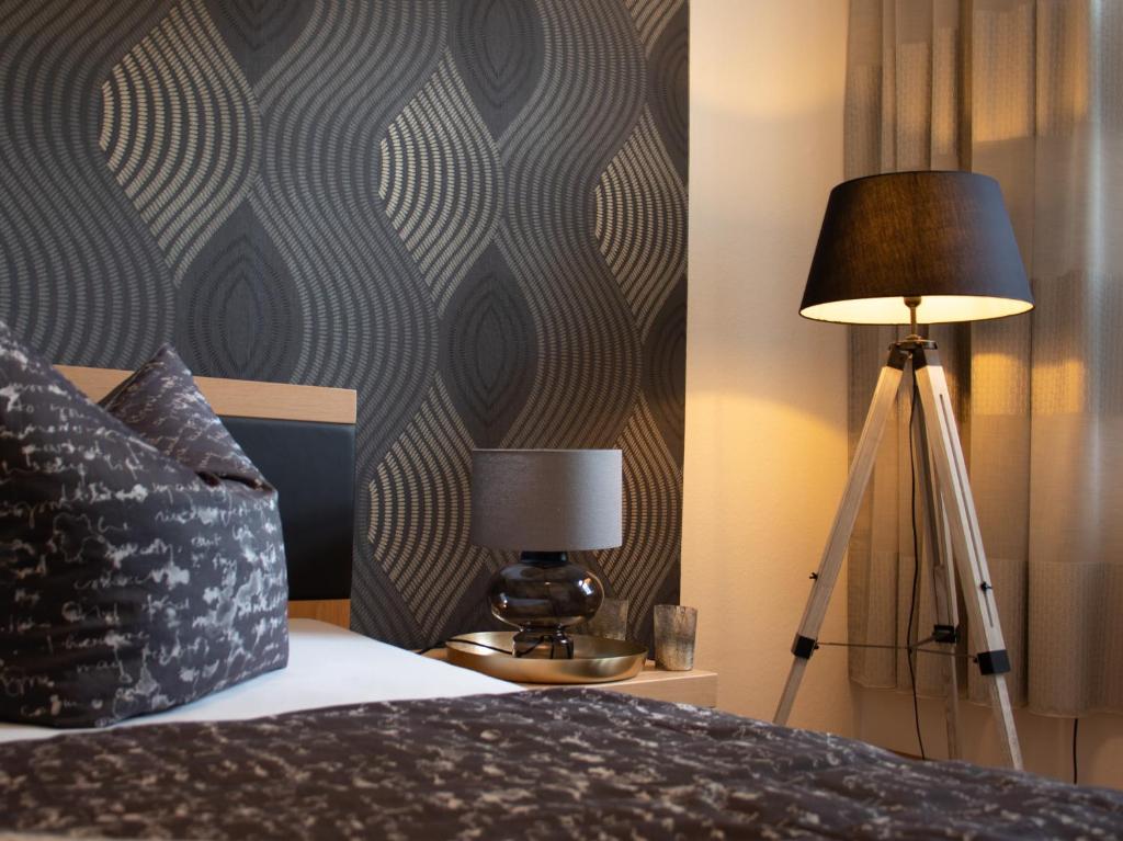 En eller flere senge i et værelse på Auer Talblick