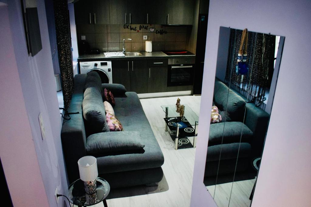 a living room with a couch and two couches at SkiathitissasMaison in Skiathos