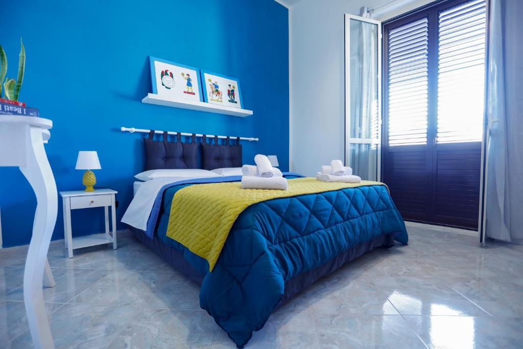 A bed or beds in a room at Biddizzi