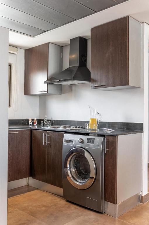 Kuchyň nebo kuchyňský kout v ubytování Santona Residence
