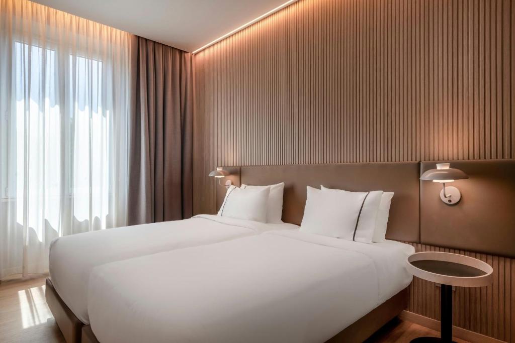 Postel nebo postele na pokoji v ubytování AC Hotel by Marriott Cartagena