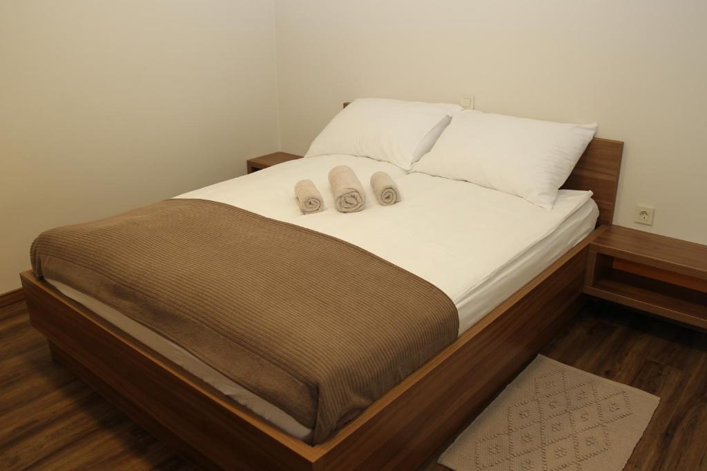 Voodi või voodid majutusasutuse Hotel Pomaranča toas