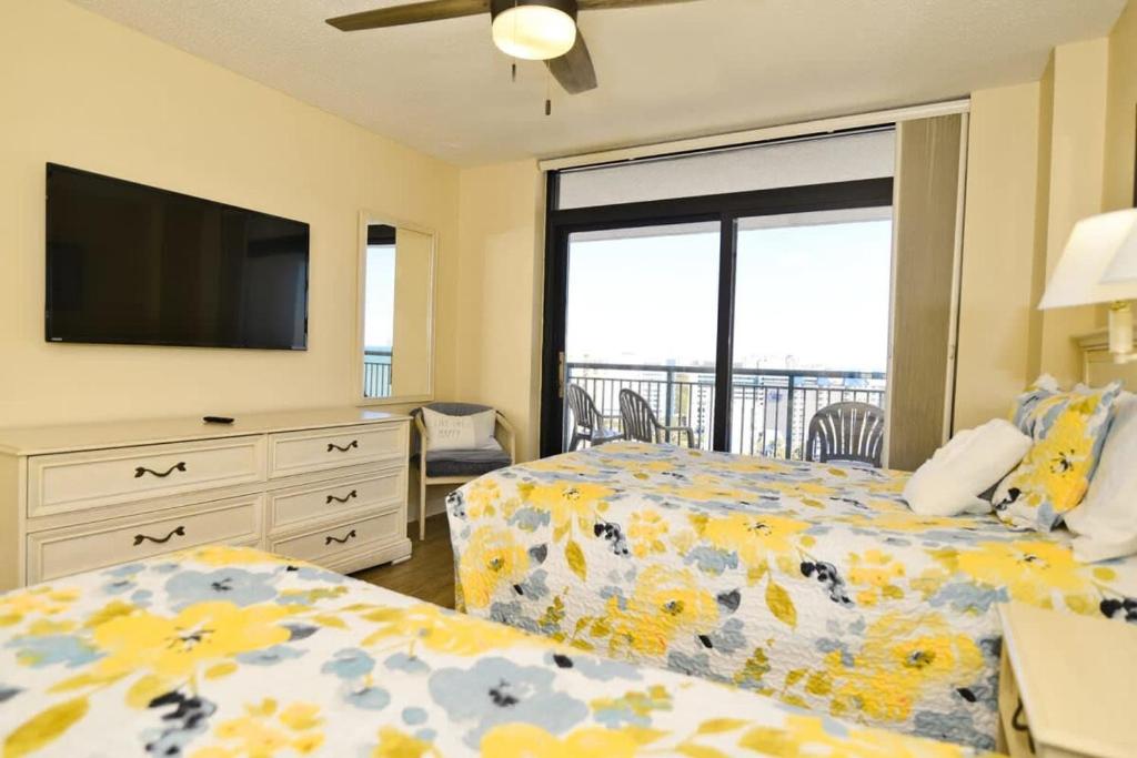 Una cama o camas en una habitación de Paradise Ocean View at Top Resort w Lazy River