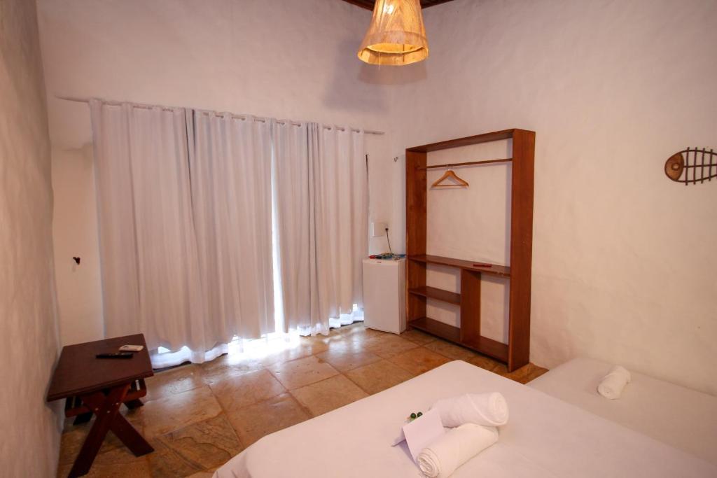 Postel nebo postele na pokoji v ubytování Palm Beach Pousada - Praia de Caetanos Quarto Casal ou Triplo