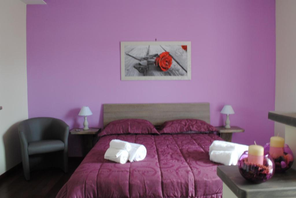 Posteľ alebo postele v izbe v ubytovaní Villa Regina B&B