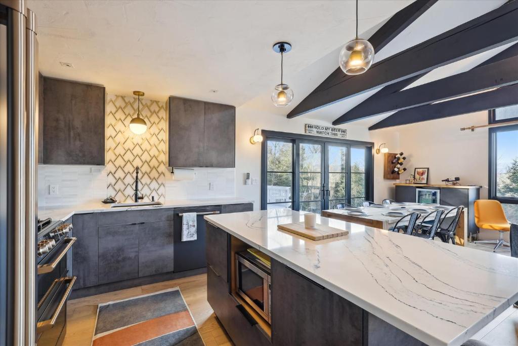 a kitchen with a large island in the middle at Mansfield View in Morrisville