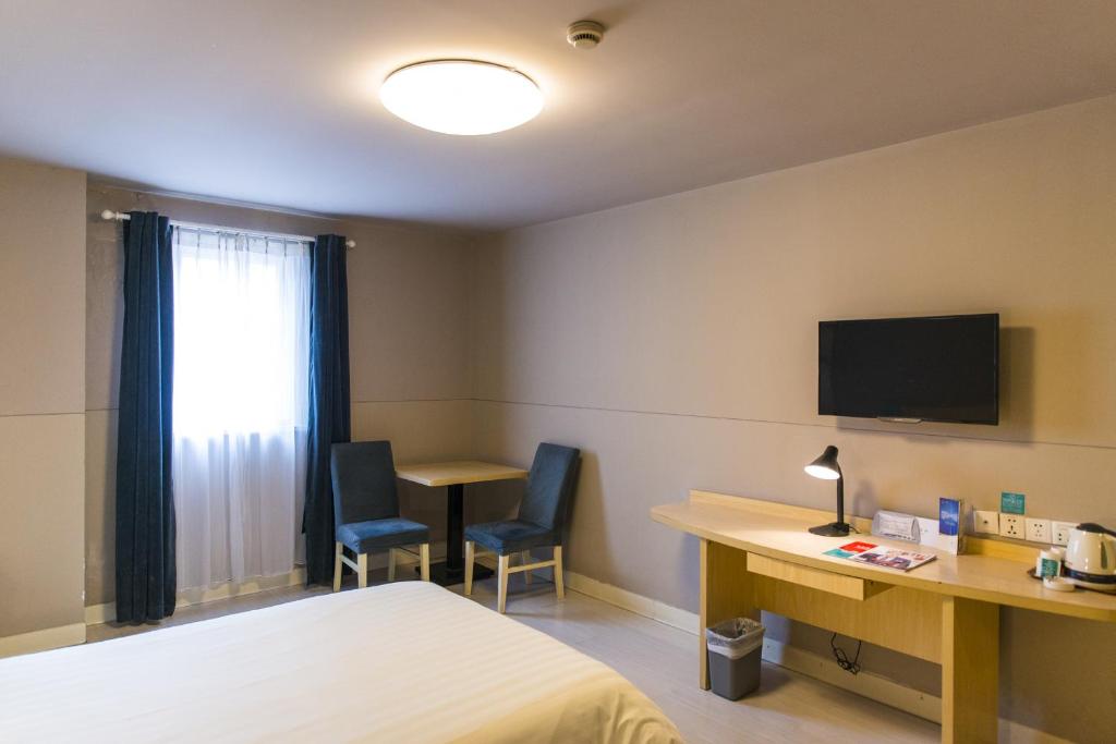 Postel nebo postele na pokoji v ubytování Jinjiang Inn - Shanghai Nanxiang