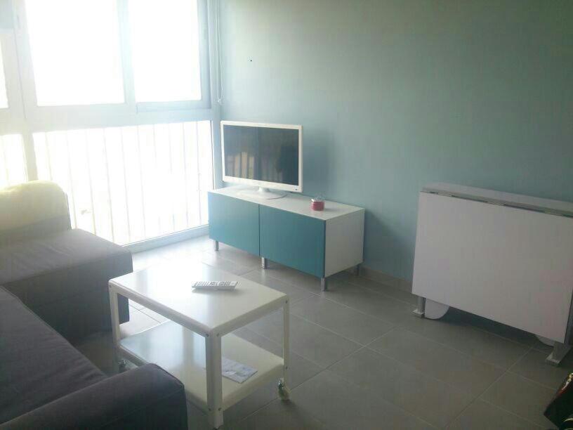 TV a/nebo společenská místnost v ubytování Apartamento Playa Ampuriabrava
