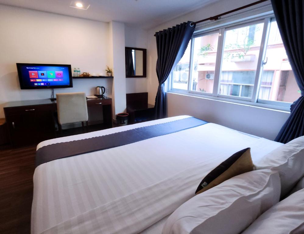 Beautiful Saigon Hotel - Habitación Deluxe Con Cama Extragrande
