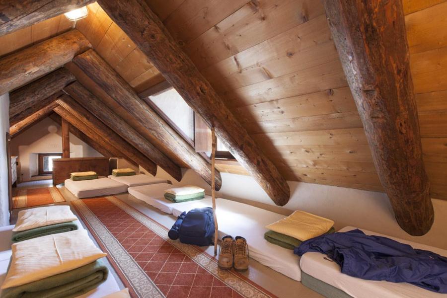 Postel nebo postele na pokoji v ubytování Antica Osteria Dazio