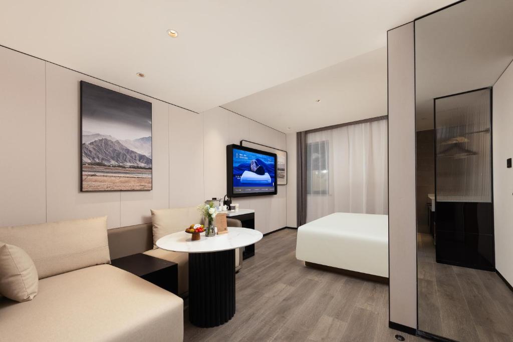 Μια τηλεόραση ή/και κέντρο ψυχαγωγίας στο Atour Hotel Beijing Guomao Dongdaqiao Subway Station