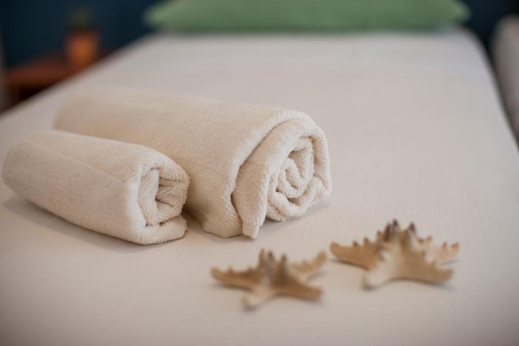 Postel nebo postele na pokoji v ubytování Hotel Taormina