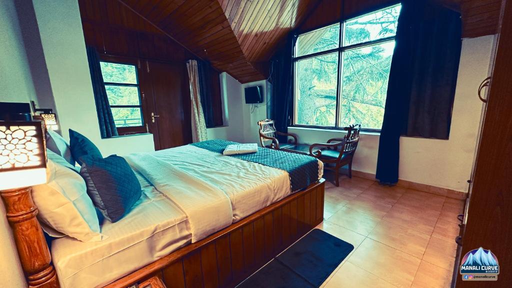 Postel nebo postele na pokoji v ubytování Manali Curve Resort