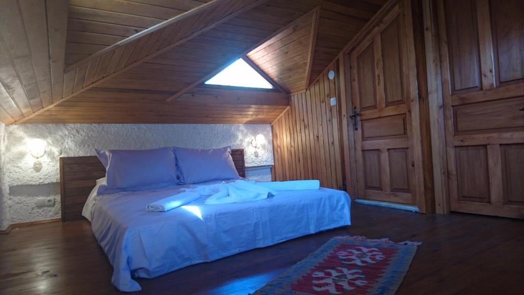 Postel nebo postele na pokoji v ubytování Şirince Klaseas Hotel&Restaurant