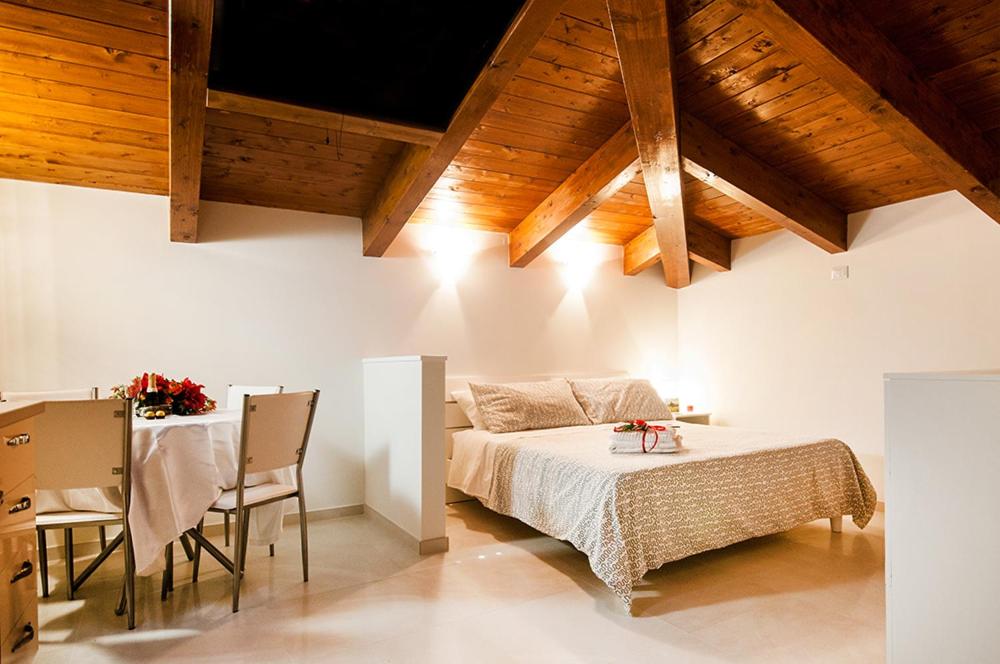 Un pat sau paturi într-o cameră la Casa Vacanza Diadema