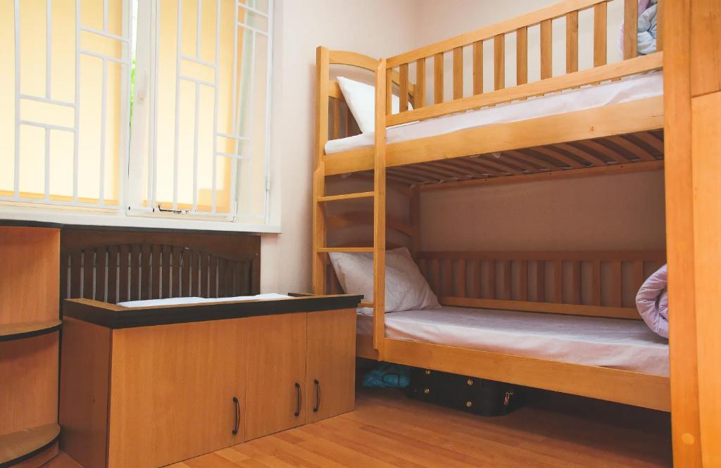 Postel nebo postele na pokoji v ubytování Globus Hostel