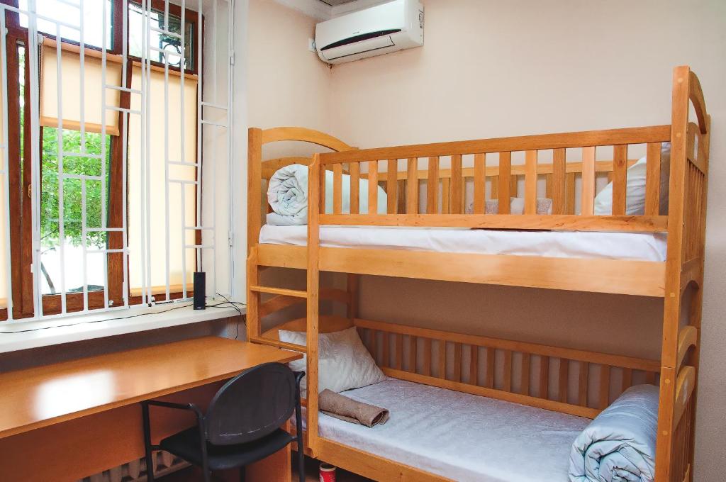 Postel nebo postele na pokoji v ubytování Globus Hostel