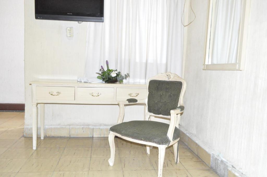 TV a/nebo společenská místnost v ubytování Hotel Metropolitan I